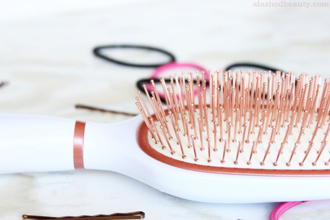 An important part of strong, shiny hair is a healthy scalp. Click through to see how I use the Goody Clean Radiance brush with copper bristles to break up buildup and achieve beautiful hair!