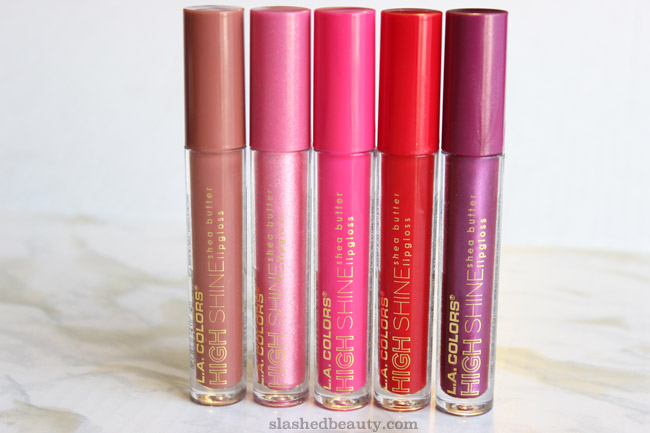 Can you believe this dollar store brand delivers such beautiful lipglosses? Click through for swatches of five of the new L.A. Colors High Shine Shea Butter Lipgloss shades.