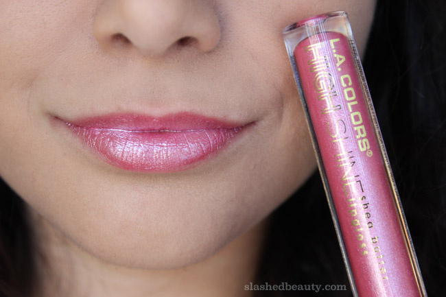 Can you believe this dollar store brand delivers such beautiful lipglosses? Click through for swatches of five of the new L.A. Colors High Shine Shea Butter Lipgloss shades. This one is the shade Playful.