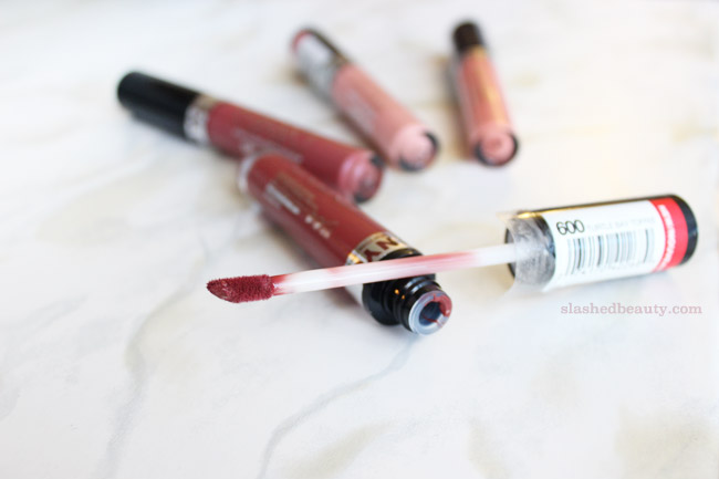 The NYC Expert Last Lip Lacquers are the newest lip gloss and lipstick fusion in the drugstore. Click through to see swatches of four gorgeous shades. | Slashed Beauty
