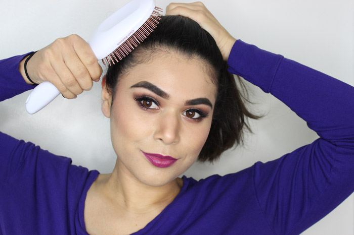 Switch things up with this twisted topknot hair tutorial. See the post for the step-by-step photos! | Slashed Beauty
