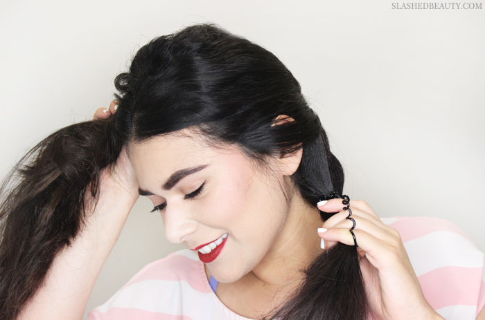 This half-up dutch braid tutorial is perfect for the warmer weather while keeping hair flowing in the breeze. See the step-by-step tutorial! | Slashed Beauty