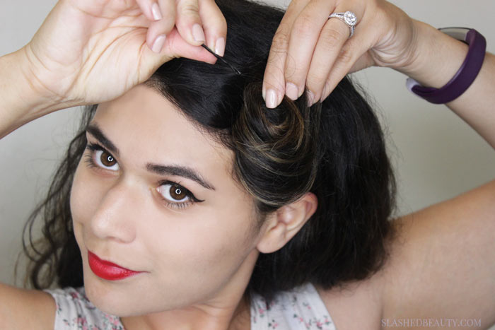 This modern American pin-up hair tutorial gives an updated twist to the classic style. See the step-by-step tutorial! | Slashed Beauty
