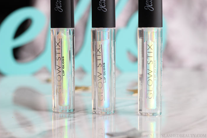 See what this holographic lipgloss looks like on top of bare lips and over lipstick! Jesse's Girl Glow Stix Lipglosses Swatches & Review | Slashed Beauty