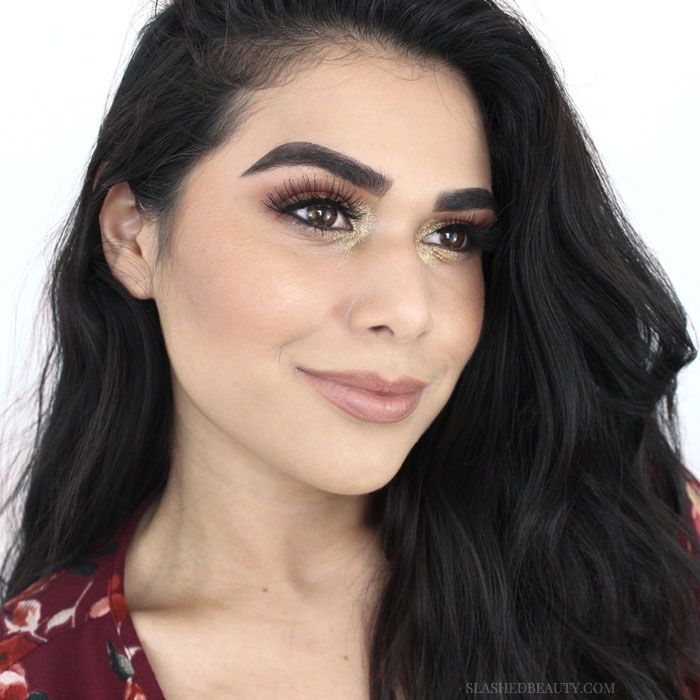 Peep this fall eyeshadow inspiration, using warm shades and gold glitter perfect for a concert festival! Watch the full fall eyeshadow tutorial. | Slashed Beauty