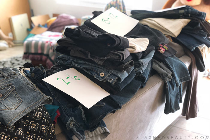 Neighborhood clothing swaps are a fun way to declutter and add to your closet for free! See how to organize a clothing swap with friends and refresh your wardrobe. | Slashed Beauty