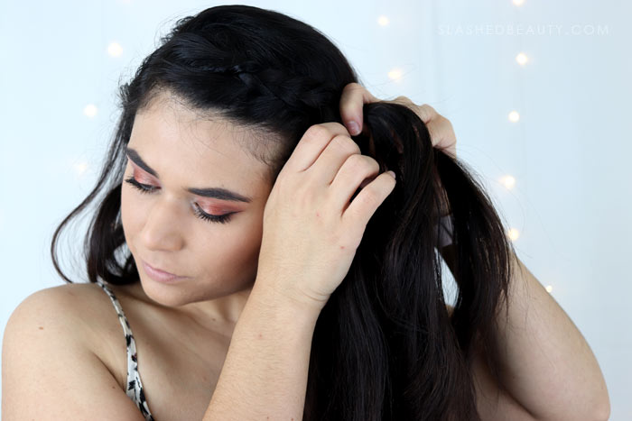 Check out this easy festival hair style: a half up crown braid that's perfect for second day hair. See the step-by-step festival hair tutorial! | Slashed Beauty