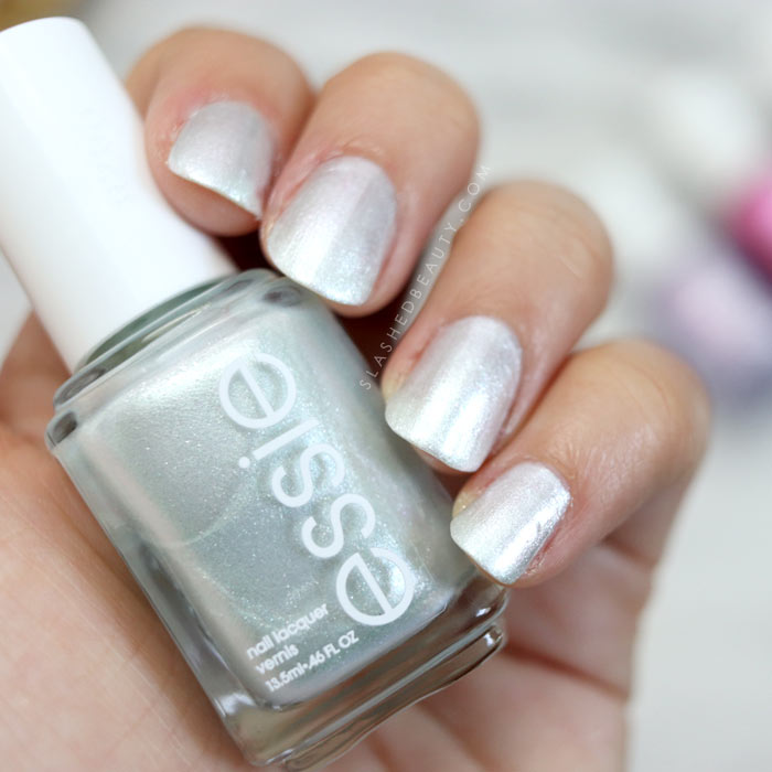 essie At Sea Level: Shimmery aqua nail polish. See swatches of the 2018 essie Seaglass Shimmers collection! | Slashed Beauty