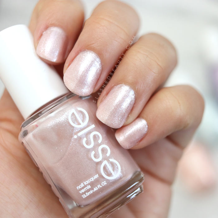 essie Don't Be Salty: Shimmery light pink nail polish. See swatches of the 2018 essie Seaglass Shimmers collection! | Slashed Beauty