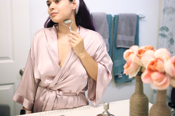 Curious about what the jade face roller trend is all about? Find out what face rollers do to your skin and if you should incorporate lymphatic massage into your routine! | Slashed Beauty