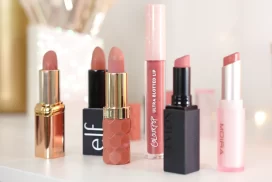 Neutral drugstore lipsticks sitting on a dresser | 6 Nude Drugstore Lipsticks for Medium Skin | Slashed Beauty