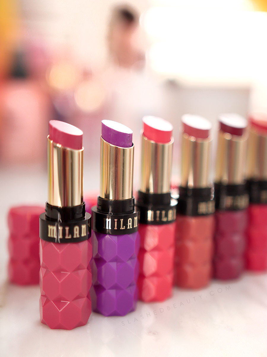 Milani Color Fetish Lipsticks side by side on a marble table. | Milani Color Fetish Lipsticks Review & Swatches | Slashed Beauty