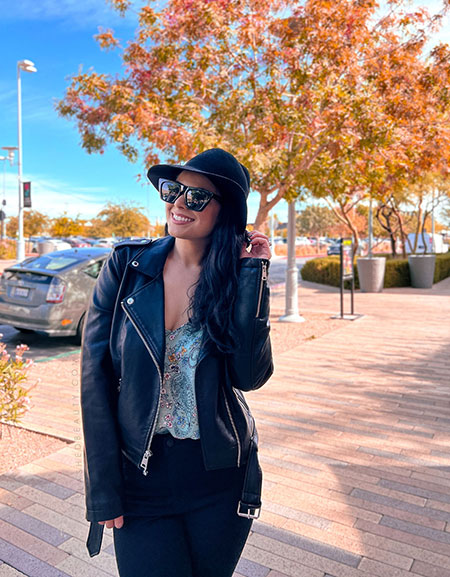 Leather jacket outfit with bright colored top, felt hat and sunglasses. | Create More Outfits with 3 Outerwear Essentials | Slashed Beauty