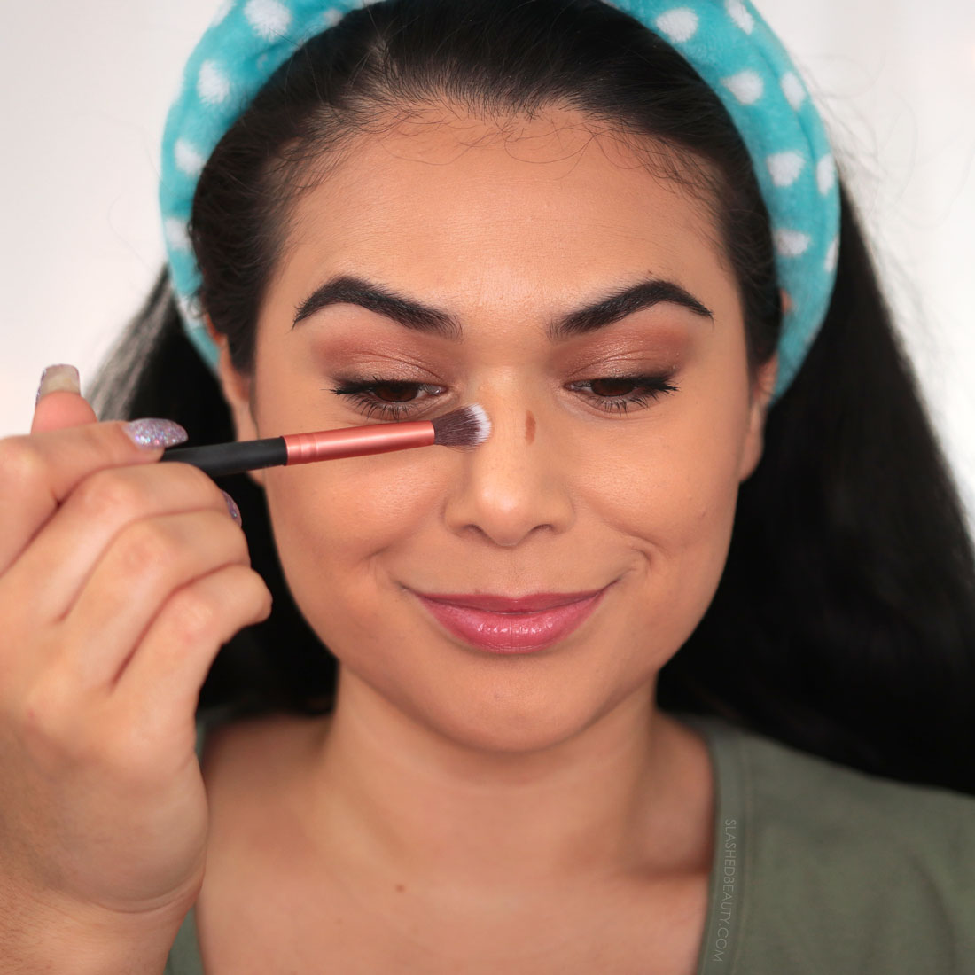 Miranda blending the nose contour with a small blending brush | How to Use a Contour Stick: 5 Tips & Mistakes to Avoid | Slashed Beauty