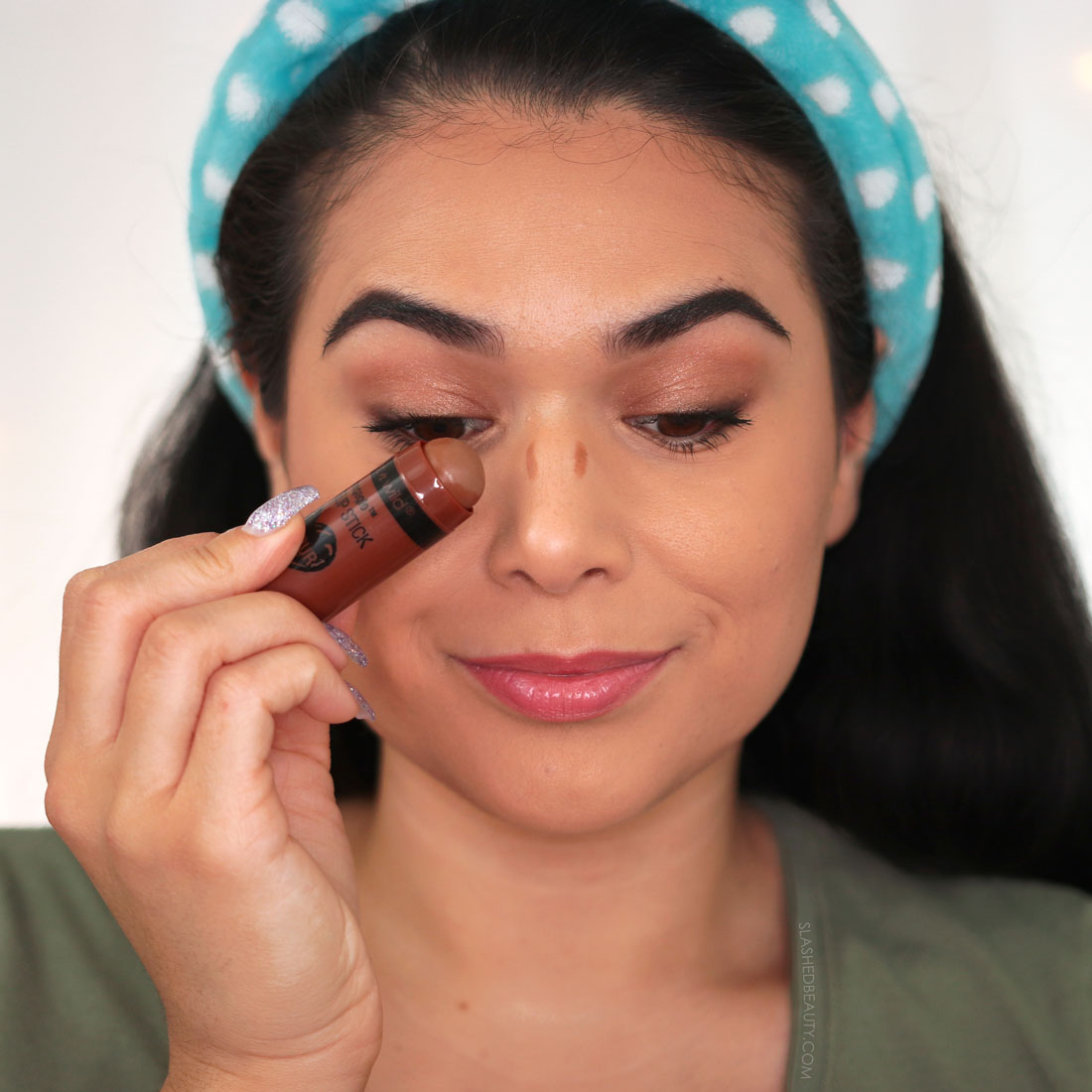 Miranda applying contour stick to the bridge of the nose | How to Use a Contour Stick: 5 Tips & Mistakes to Avoid | Slashed Beauty