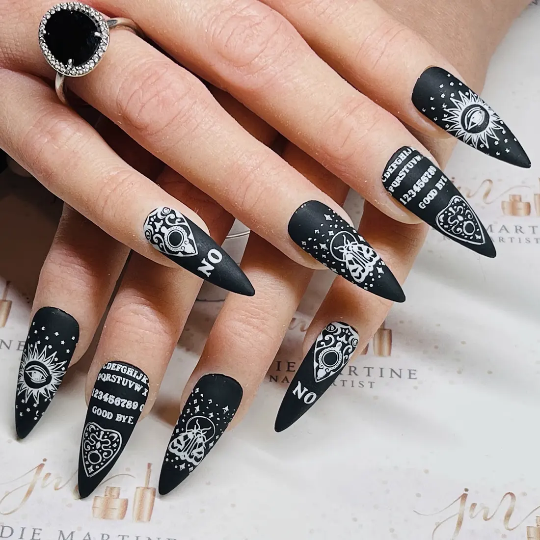 Closeup of ouija board nail art manicure | 9 Witchy Nail Designs You Can Buy as Press-Ons on Etsy | Slashed Beauty