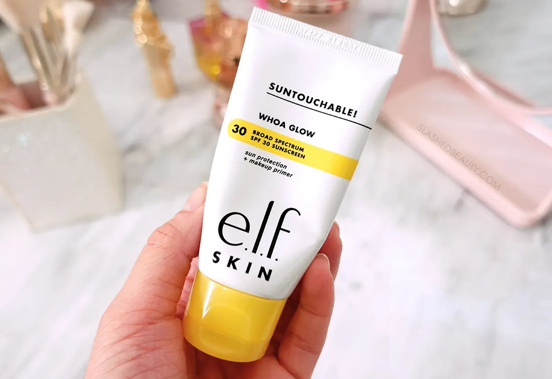 Hand holding tube of e.l.f. Woah Glow Sunscreen Primer | The 5 Best New Drugstore Beauty Finds of 2023 | Slashed Beauty