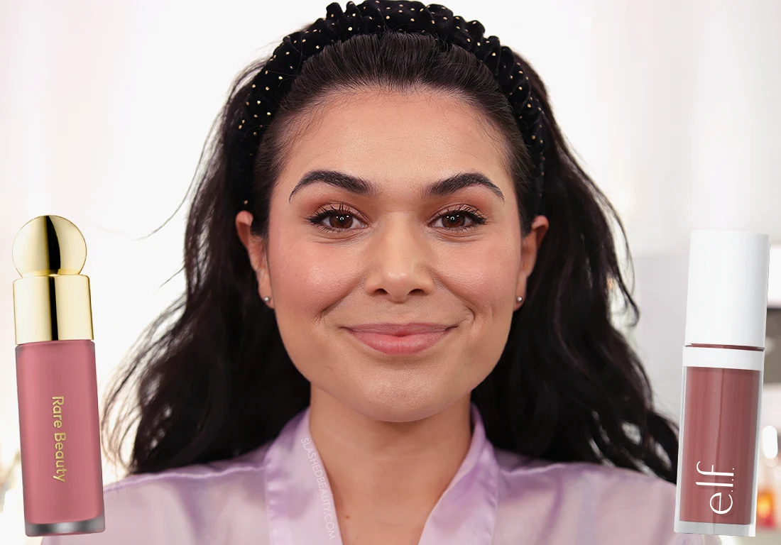 Miranda smiling to camera wearing e.l.f. Camo Liquid Blush in Suave Mauve on the right and Rare Beauty Soft Pinch Liquid Blush in Encourage on the left | e.l.f. Camo Liquid Blush Review - Rare Beauty Dupes? | Slashed Beauty