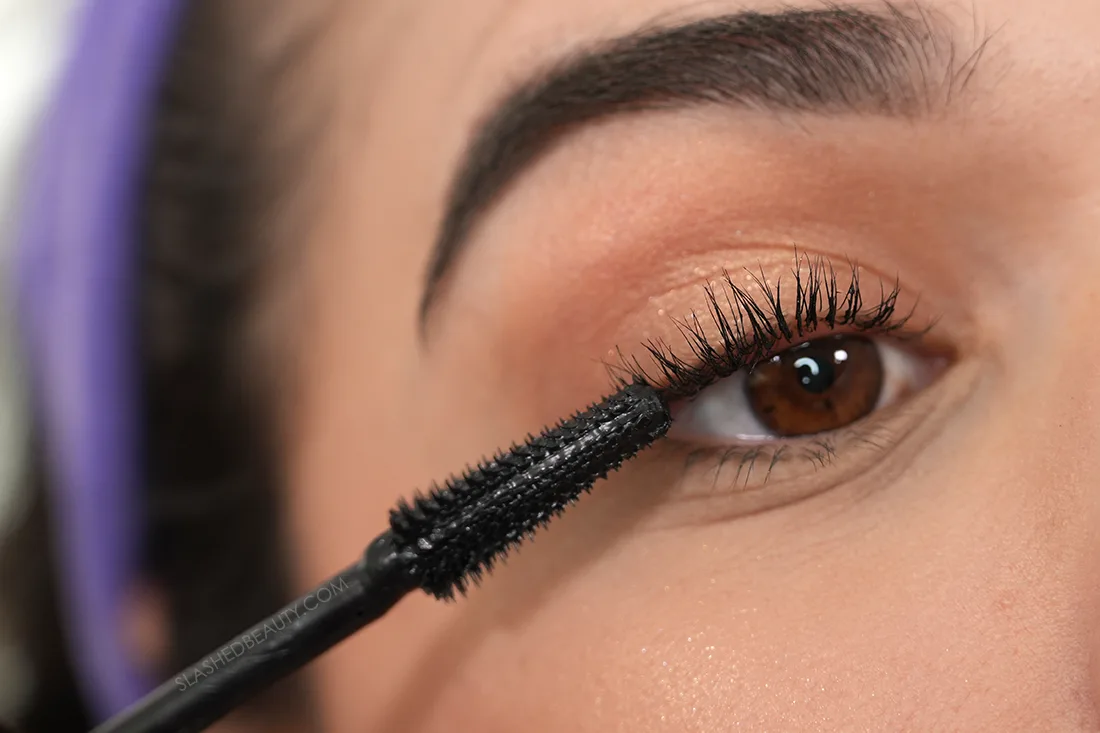 Close up of mascara application, showing the cone-shaped comb wand | L'Oreal Voluminous Panorama Mascara Review | Slashed Beauty
