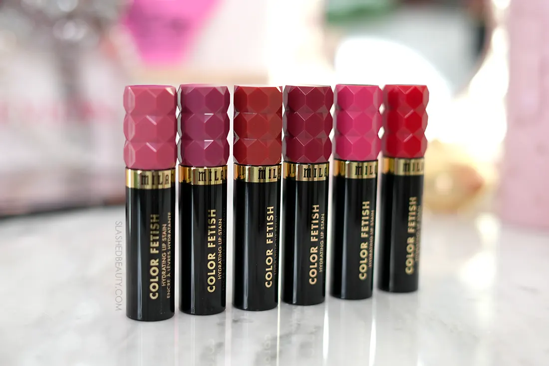 Milani Color Fetish Lip Stain tubes standing side by side on a vanity | Review & Swatches | Slashed Beauty